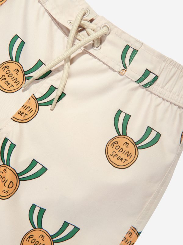 Mini Rodini Boys Medals Print Swim Shorts in Ivory Online now